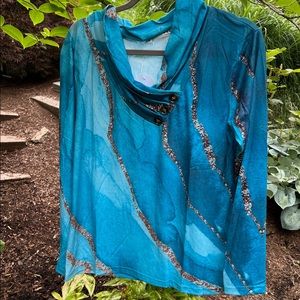 Blue blouse with silver shimmer perfect for day or evening wear.